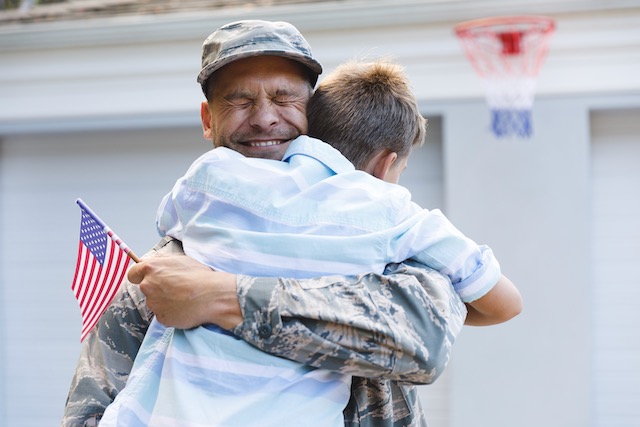 Relax, serviceman greeting son after overseas deployment 